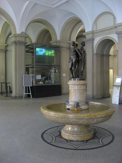 Fountain in the Hauptgebaude Main Hall with the Coffee Bar in the Background